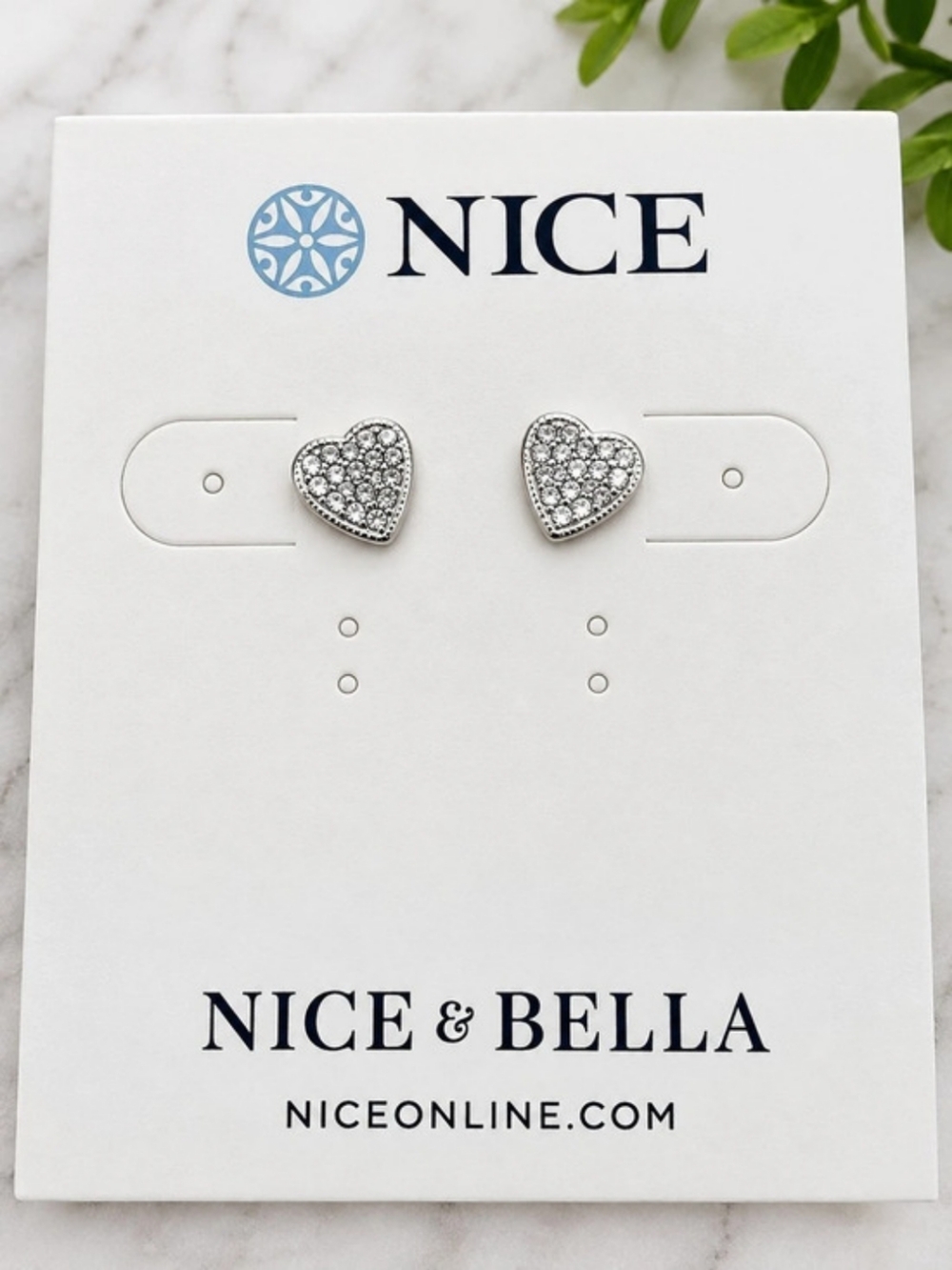 Nice & Bella Rhodium plated heart earrings with cutout and sparkling finish